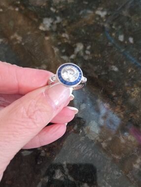 Sterling Silver Blue Halo Solitaire Ring with Clear Center Stone